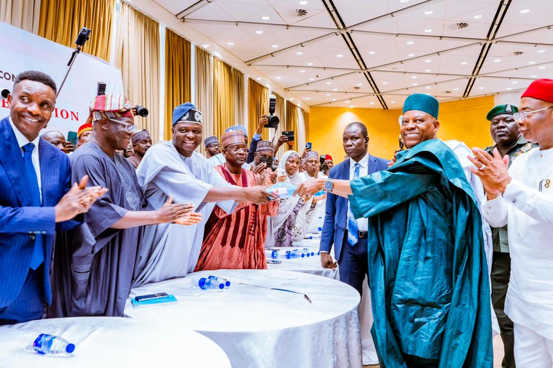 VP Shettima submitting President Tinubu's nomination form to APC Chairman, Professor Yilwatda